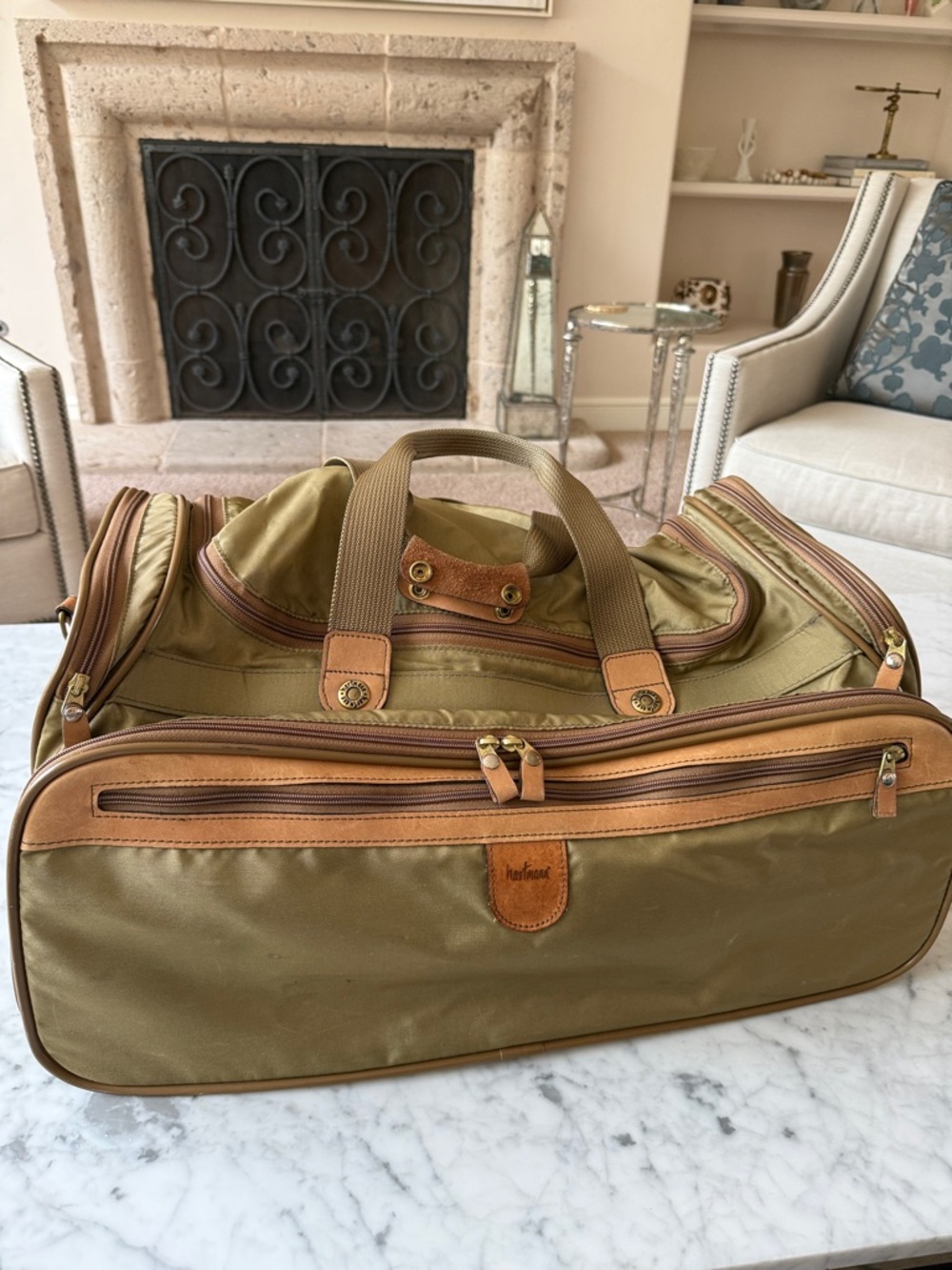 Hartmann khaki green lightweight nylon duffle bag with leather accents. Vintage